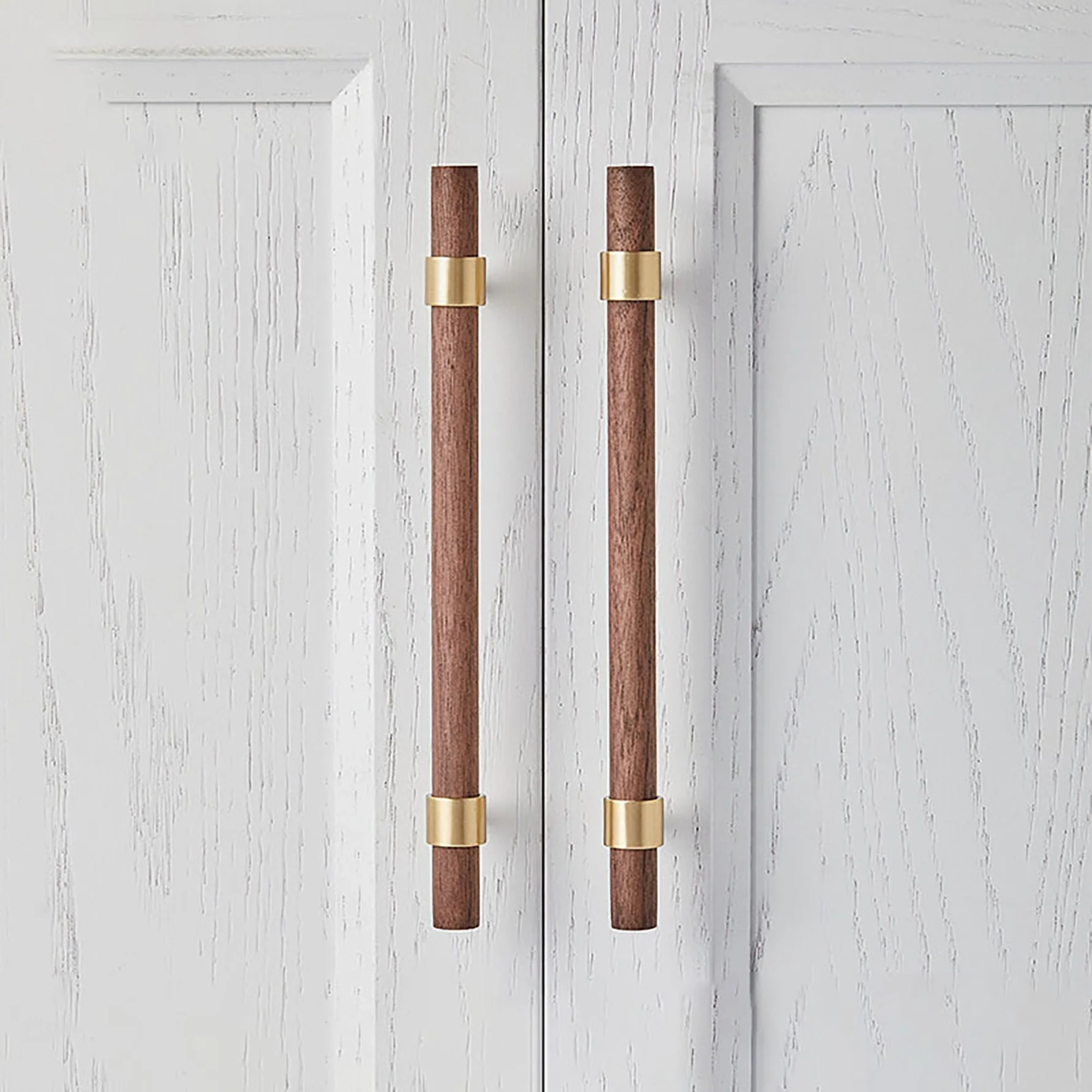 Brass Essence Walnut and brass T-Bar handle from collection W-0010, showcasing a sleek wooden and metal furniture hardware design.