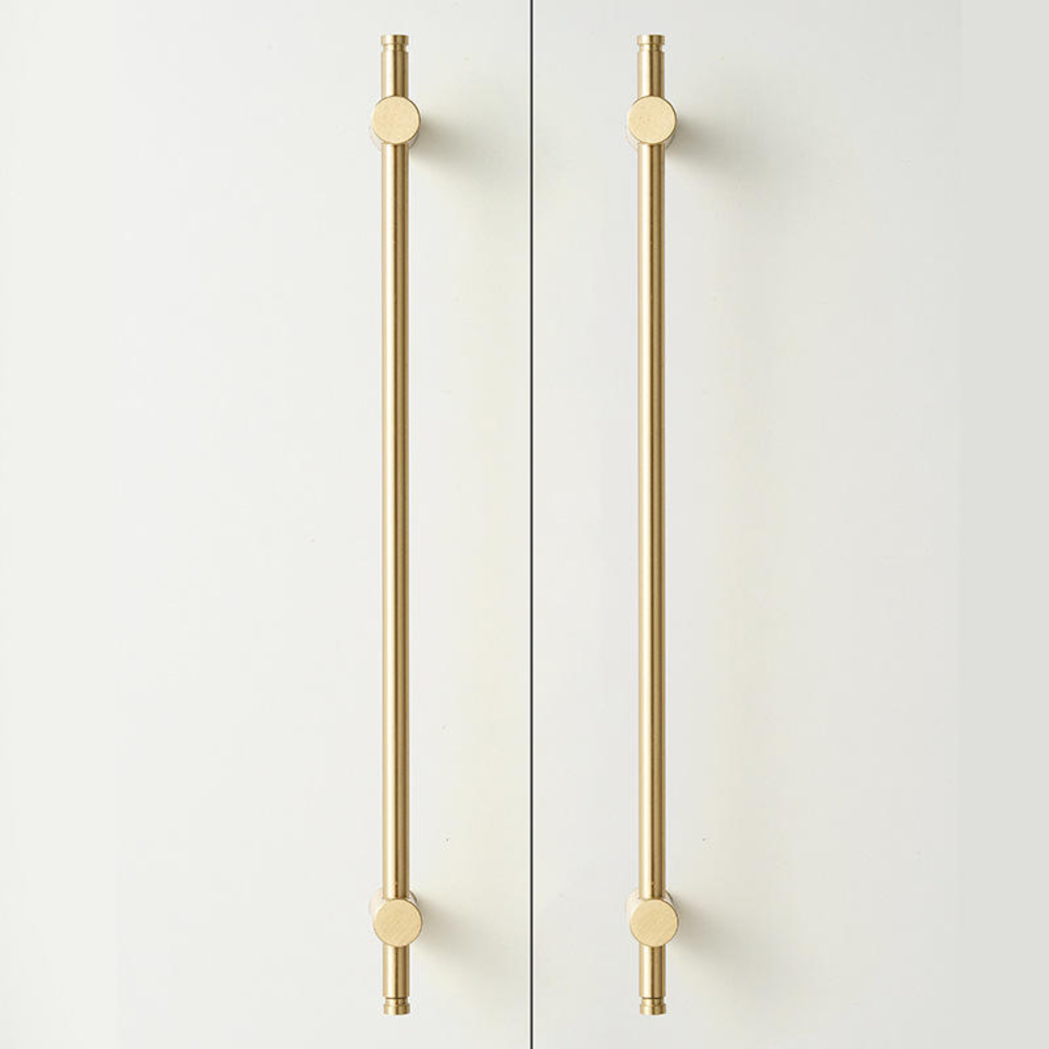 Adjustable solid brass bar handle from Brass Essence collection, featuring a sleek, polished finish and sturdy design for furniture or cabinetry.