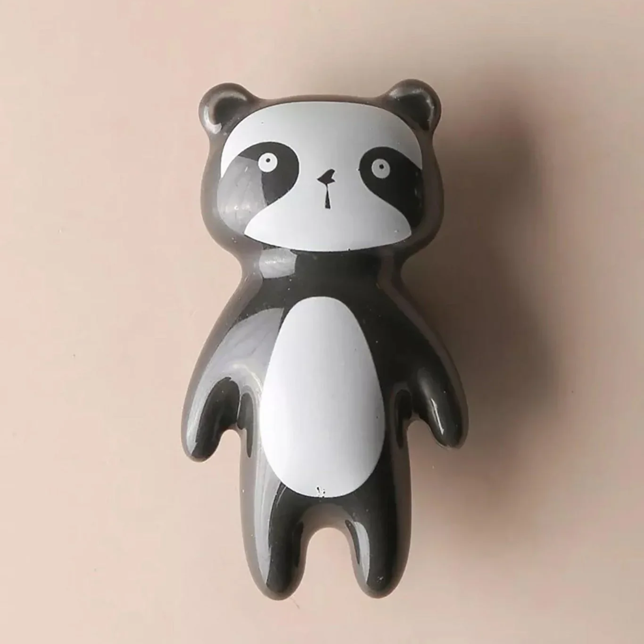 Ceramic animal cabinet pull from Brass Essence collection, featuring a detailed animal design for furniture handles and pulls.