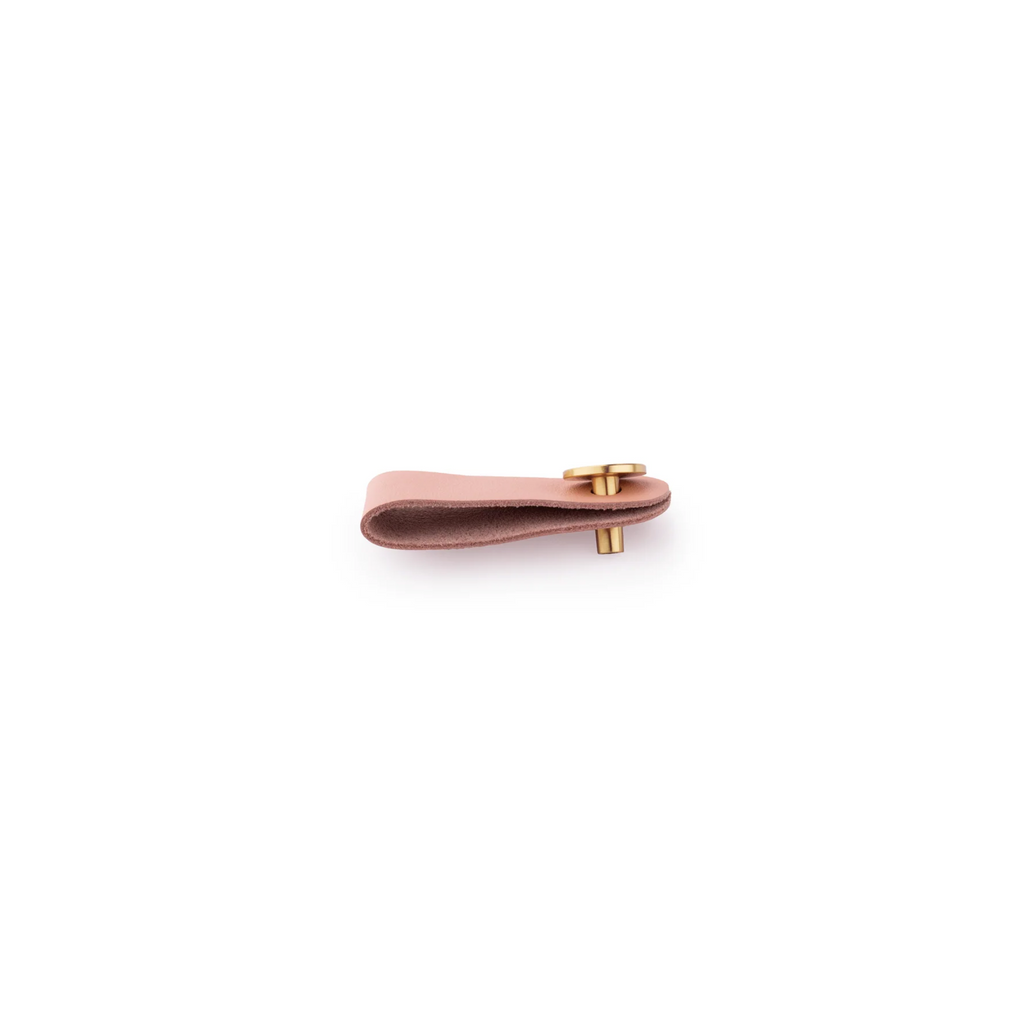Brass Essence leather and brass strap cabinet pulls with sleek design, showcasing the combination of leather strap and brass hardware.