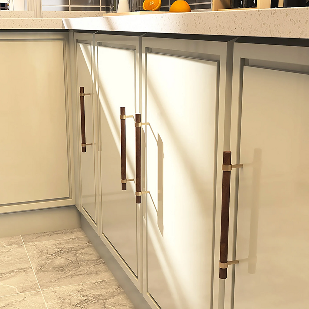 Brass Essence Walnut & Brass T-Bar Handle Collection, featuring sleek wooden and brass T-bar handles on a white background