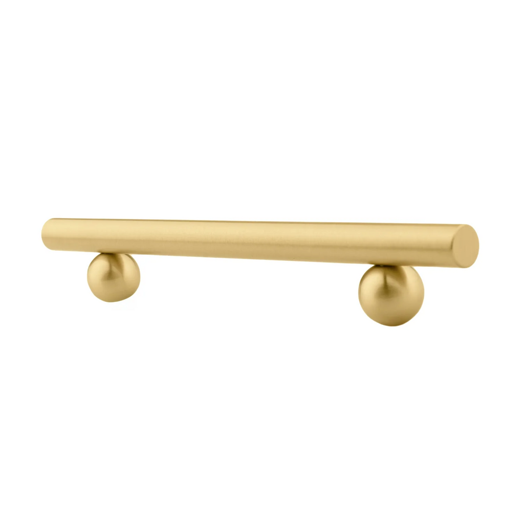 Solid brass goblet cabinet handle from Brass Essence's collection, featuring a sleek, polished design for kitchen or furniture use.