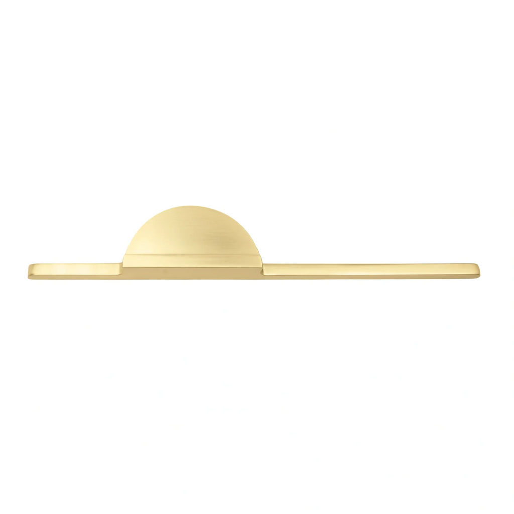 Brass Essence Hemi Cycle Zinc Half-Circle Pull handle with a polished finish, mounted on a wooden drawer for cabinet furniture.