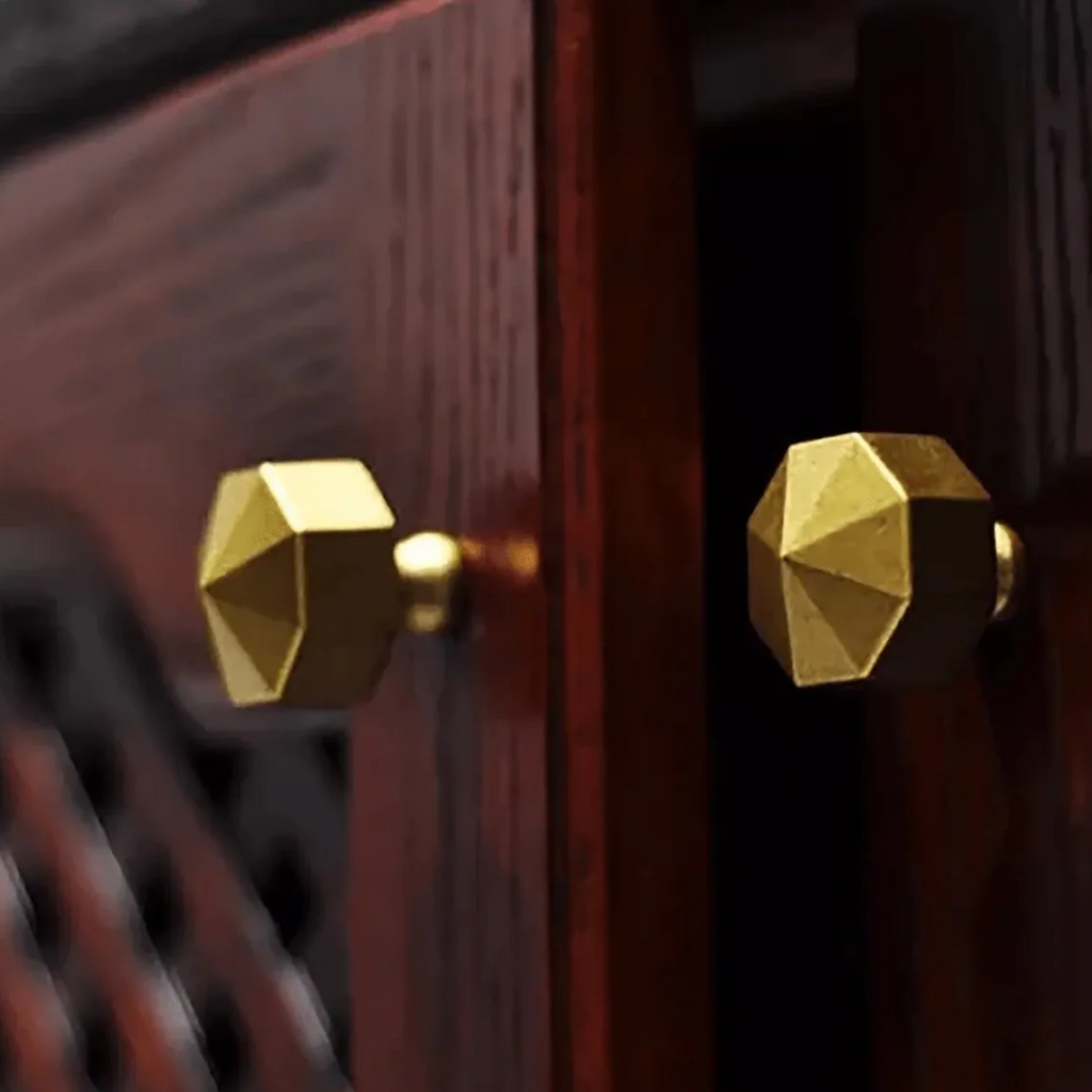 Octagon brass cabinet knob with geometric design by Brass Essence, featuring a polished brass finish and a stylish, modern look.
