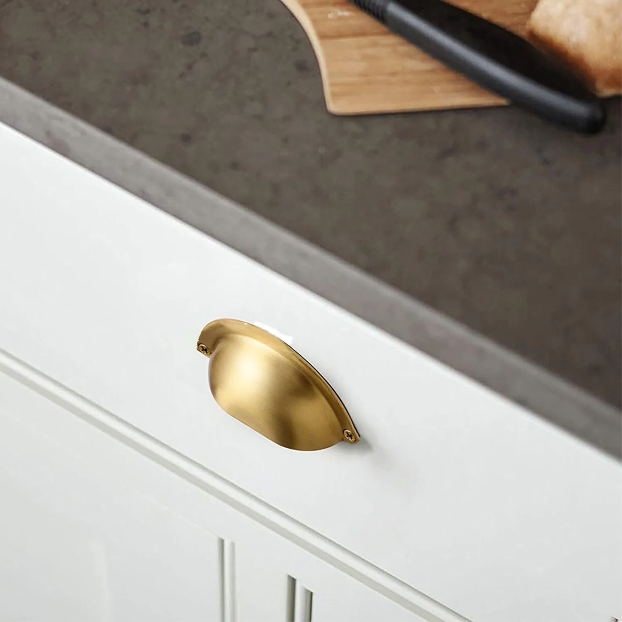 Brass essence Classic brushed brass shell pull handle, modern cabinet hardware with a smooth, curved design and brushed finish.