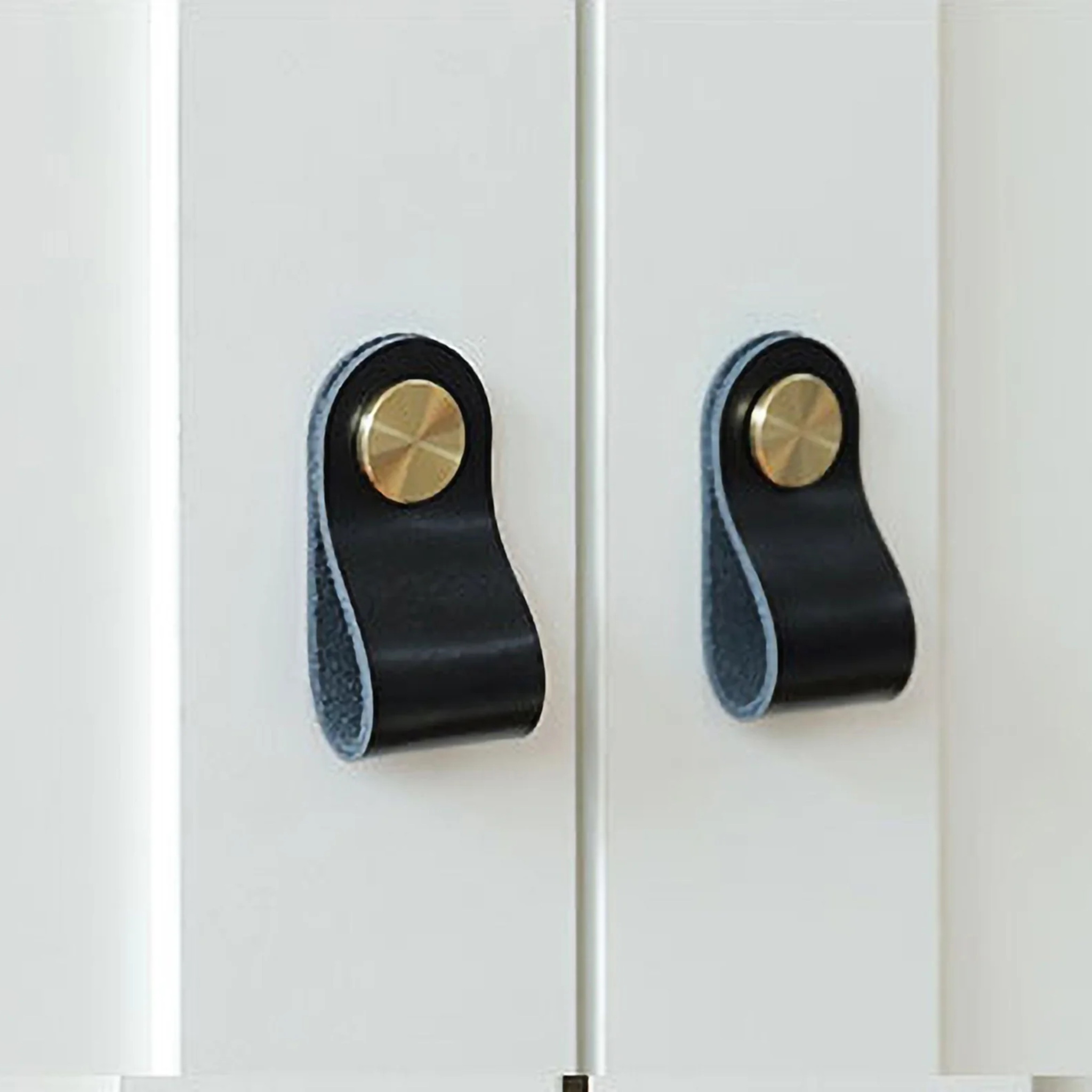 Brass essence Leather and brass strap cabinet pulls, stylish hardware with leather accents and polished brass finish.