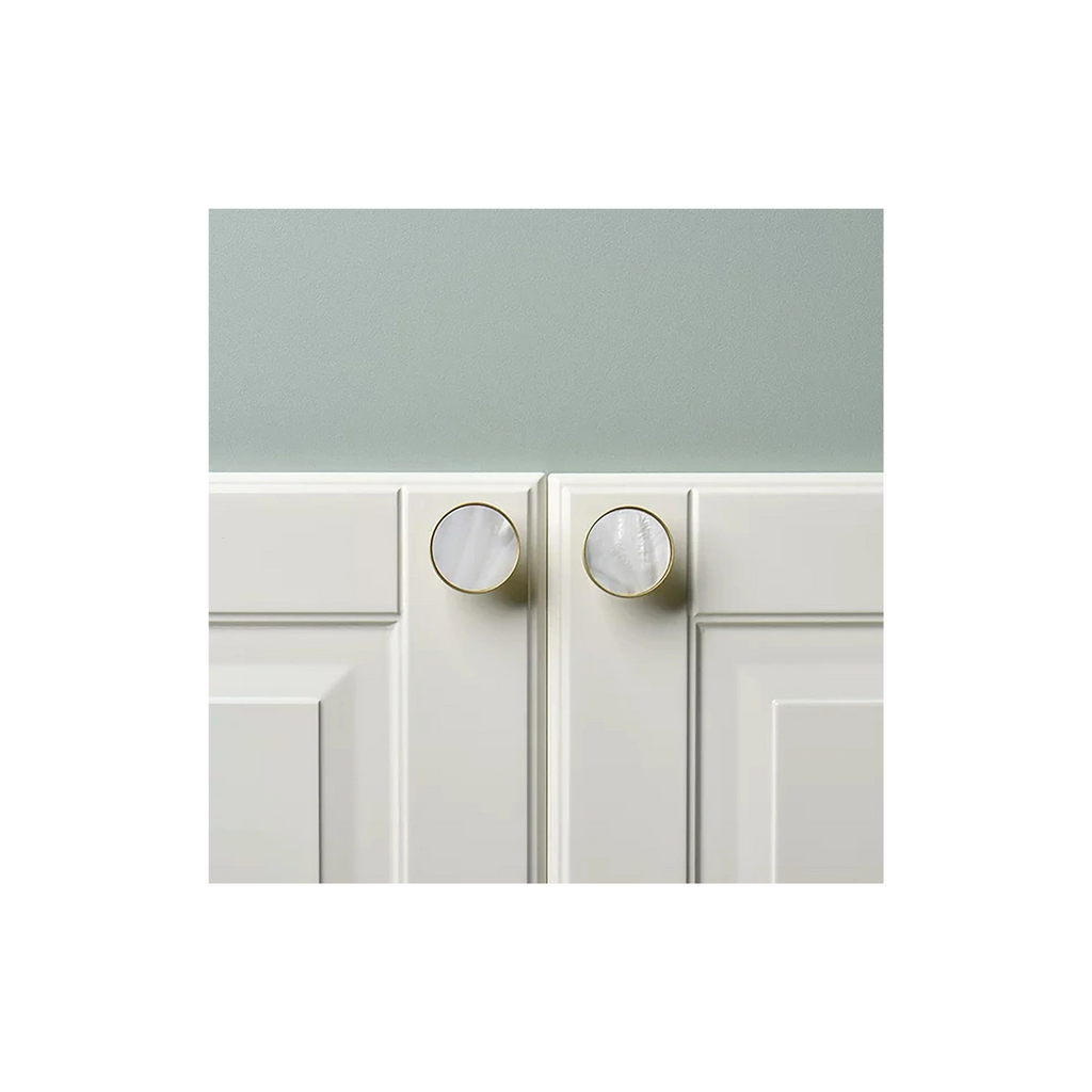 Mother of Pearl and brass round cabinet knob by Brass Essence, showcasing a polished, elegant decorative hardware piece.