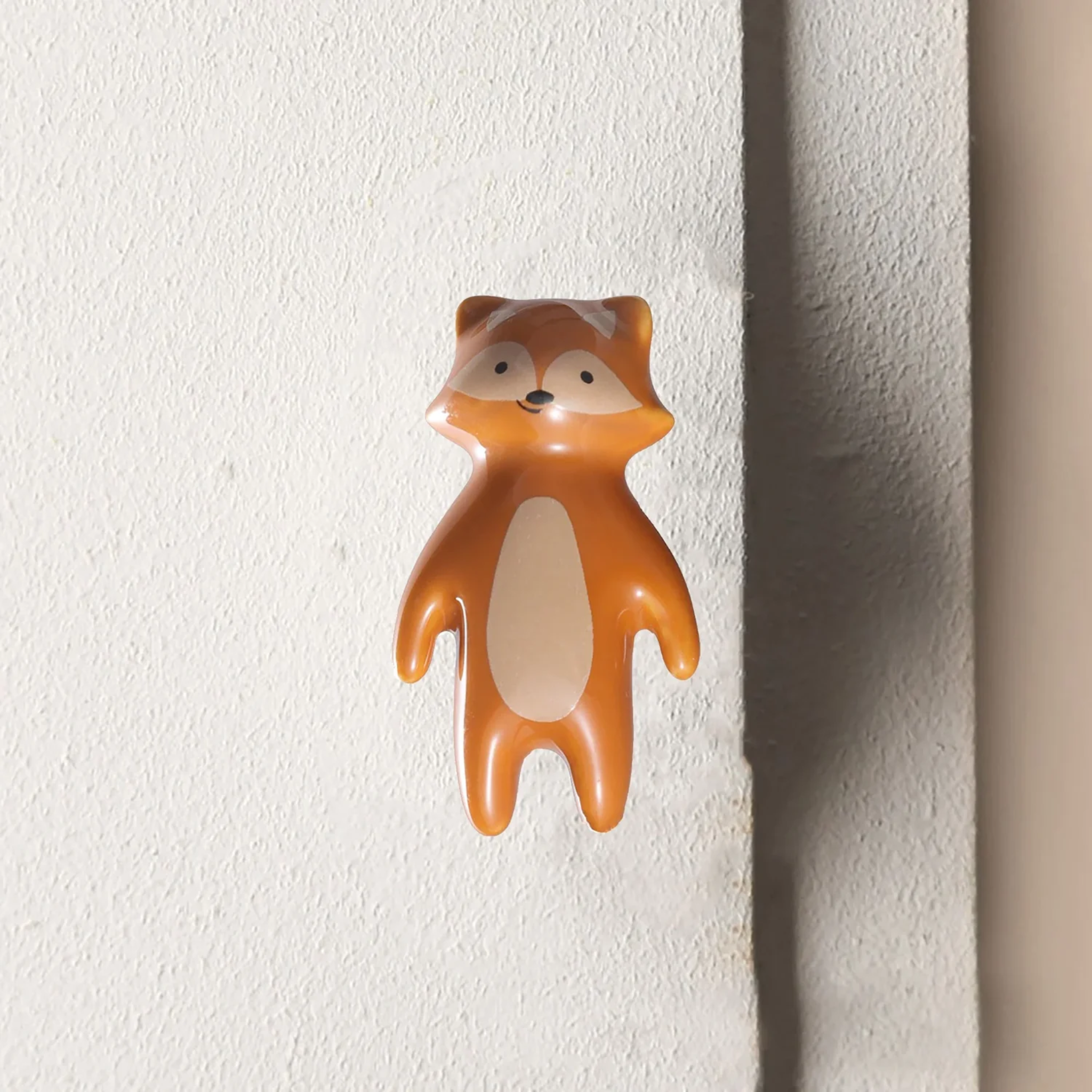 Ceramic animal cabinet pull from Brass Essence collection, featuring a detailed animal design for furniture handles.