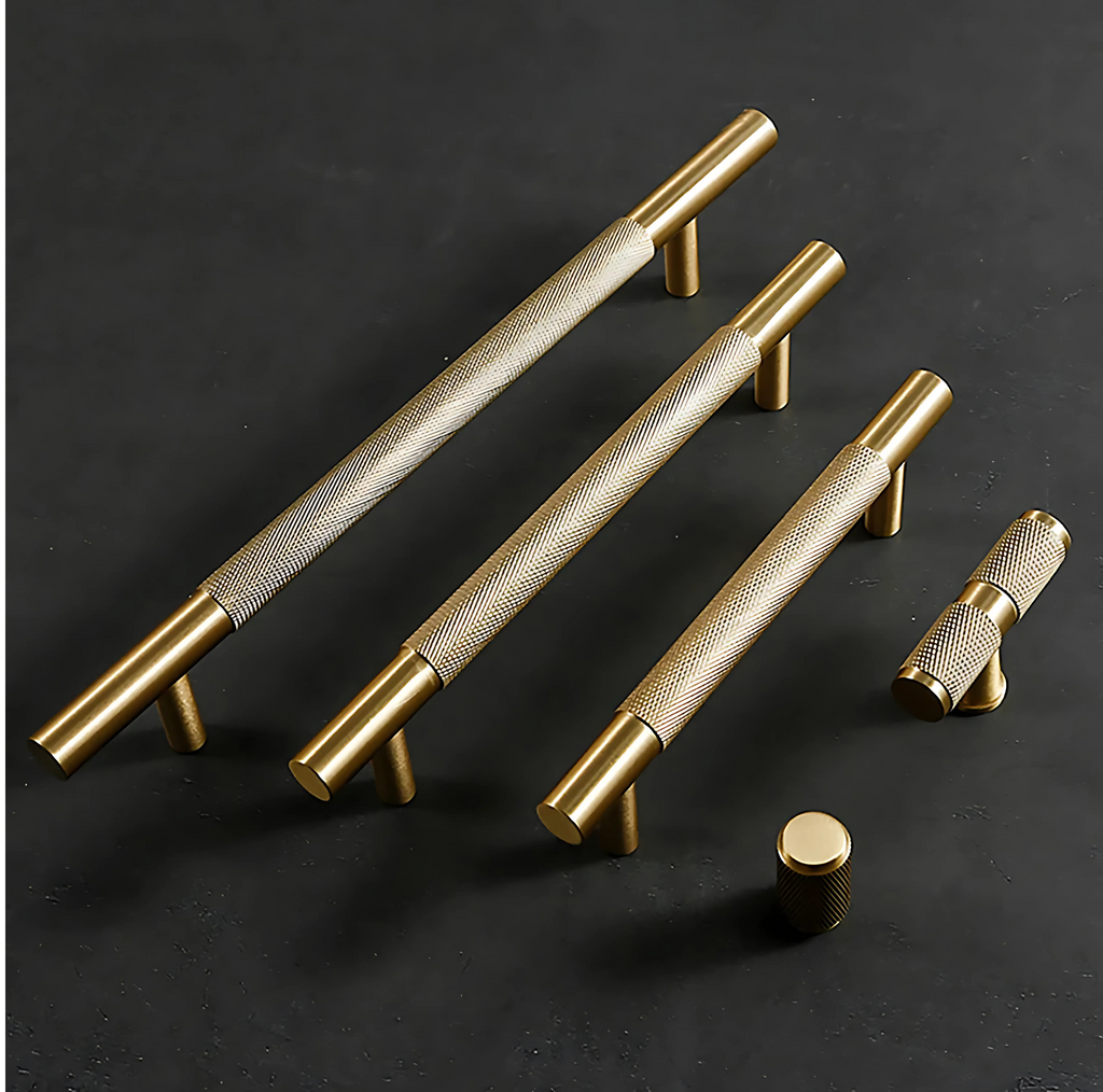 Brass essence Yashvite knurled brass cabinet handle from the B-0060 collection, featuring a textured, polished surface with mounting hardware.