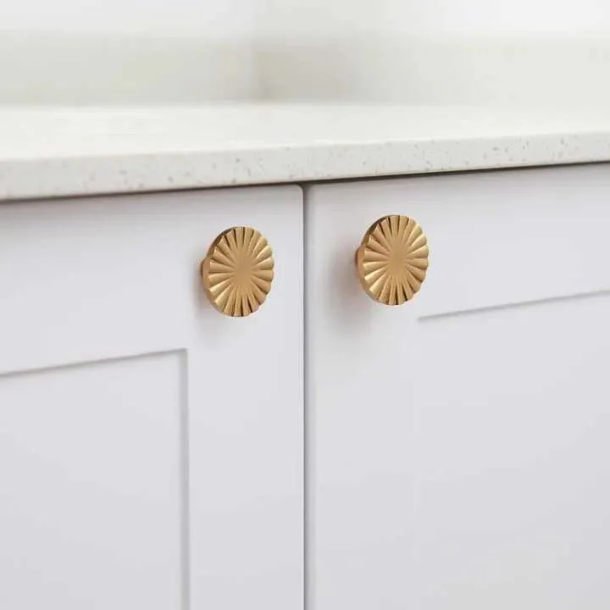 Brass essence Cherry Blossom Sunburst Brass Knob with intricate floral design, shiny brass finish, ideal for cabinet or drawer hardware.