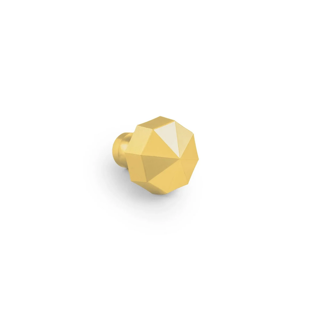 Octagon brass cabinet knob from Brass Essence featuring a geometric design and polished brass finish.