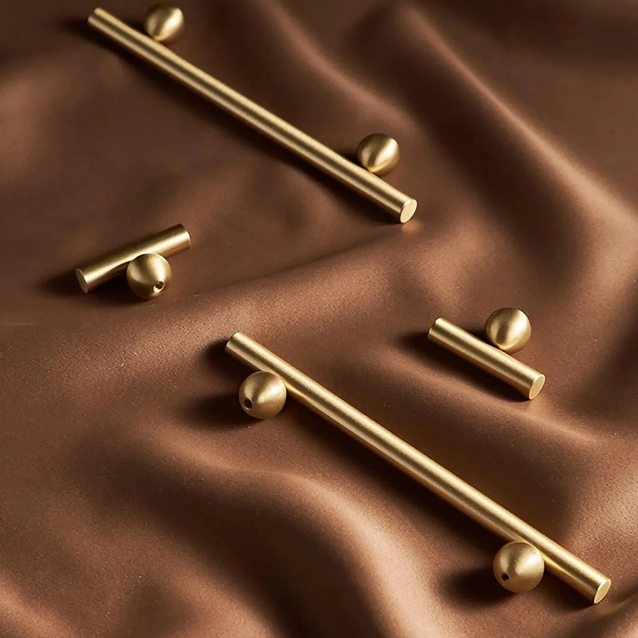 Solid brass goblet cabinet handle from Brass Essence collection, showing a polished, elegant design for furniture hardware.