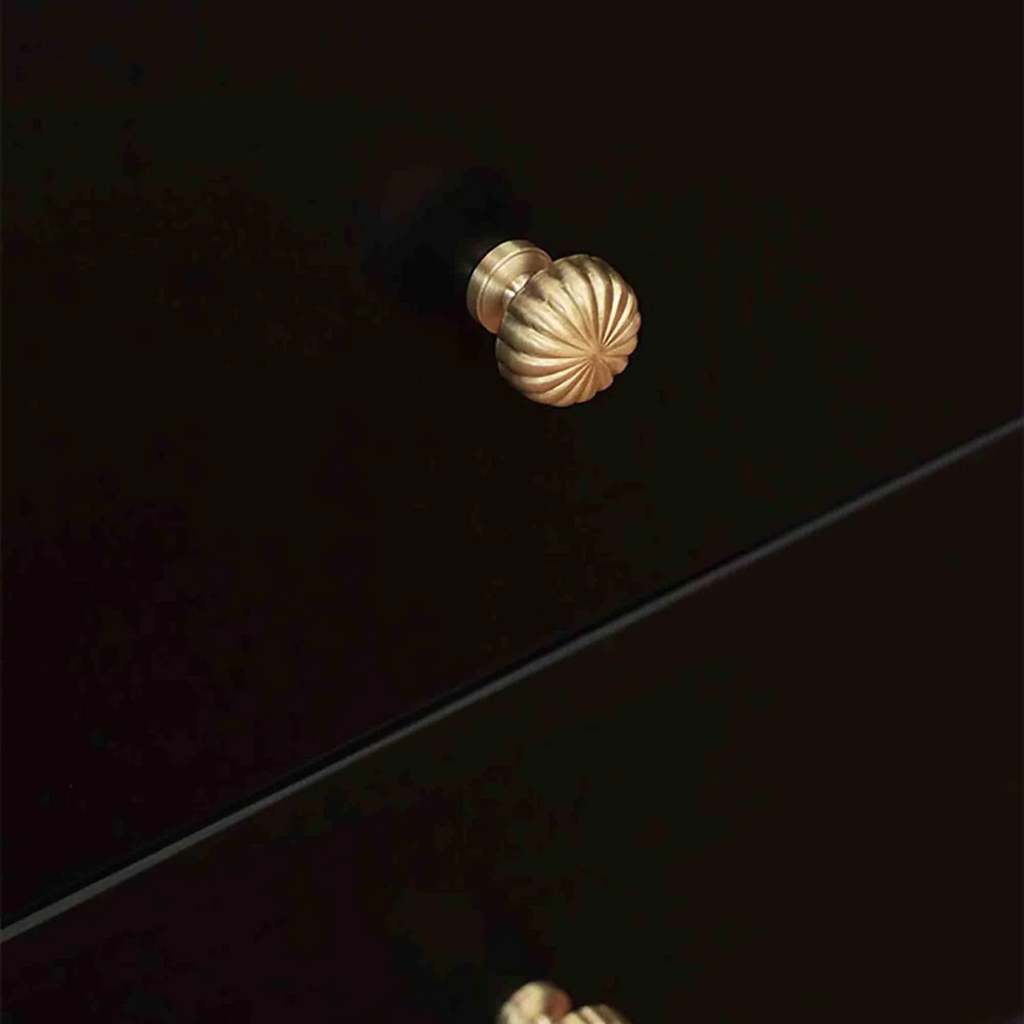 Brass Essence fluted pumpkin solid brass cabinet knob in gold finish, featuring a decorative pumpkin design for furniture accents.