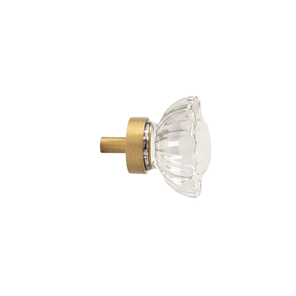 Faceted crystal and brass cabinet knob by Brass Essence, showcasing shiny, geometric design for furniture hardware.