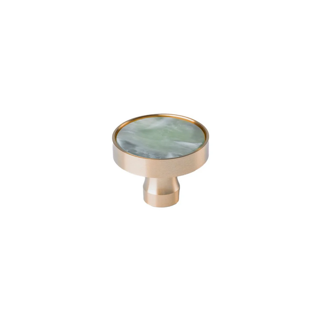 Acrylic and brass disc cabinet knob by Brass Essence, featuring a sleek round design with a polished brass finish.