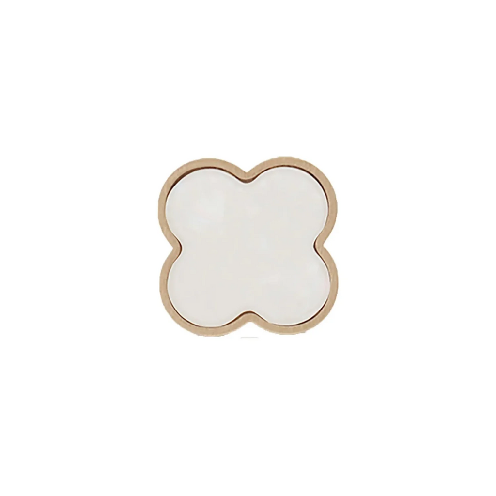 Brass essence Clover Brass Cabinet Knob from collection, showing a polished brass finish and classic round design on a cabinet door.