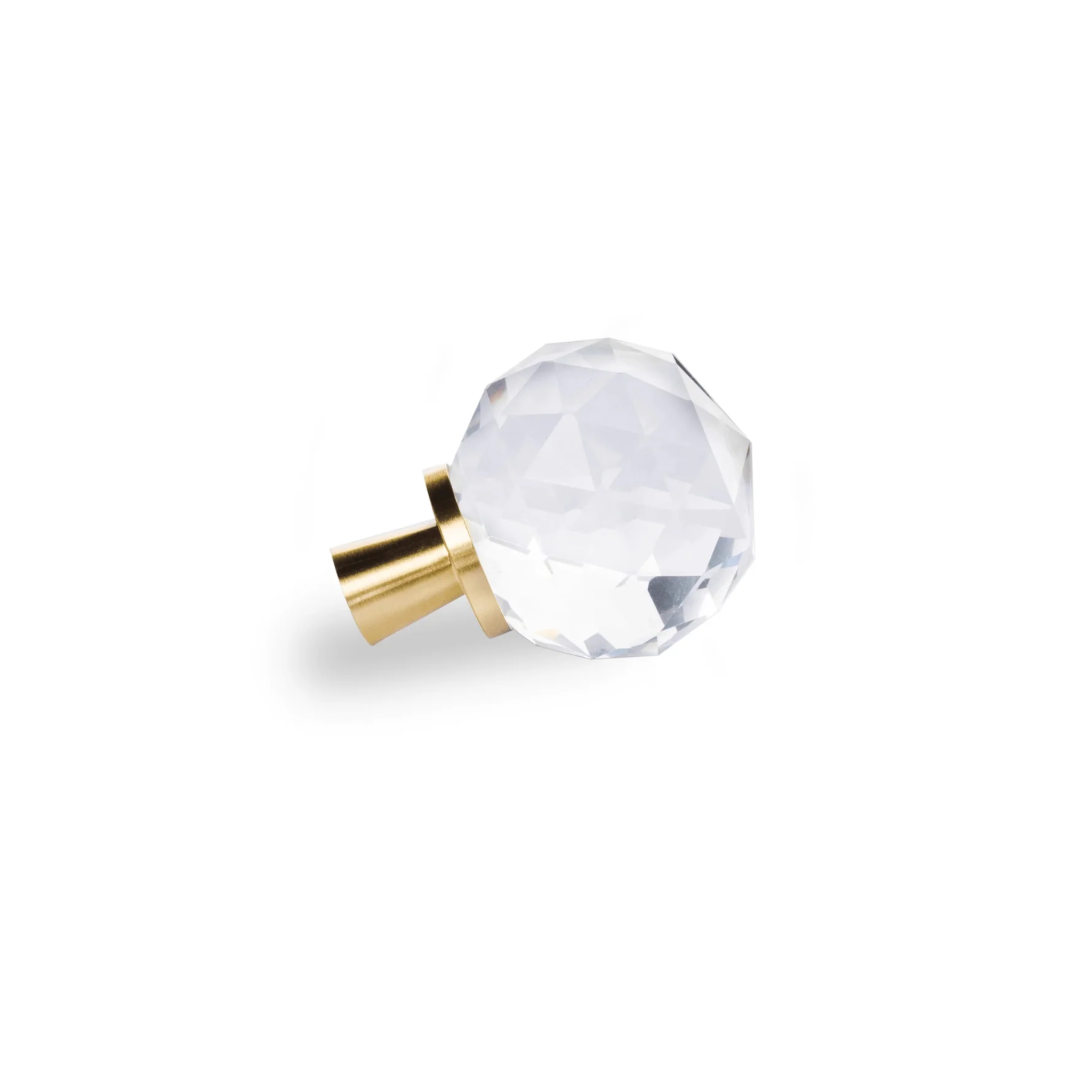 Faceted crystal and brass cabinet knob by Brass Essence, showcasing a sparkling crystal with polished brass finish.