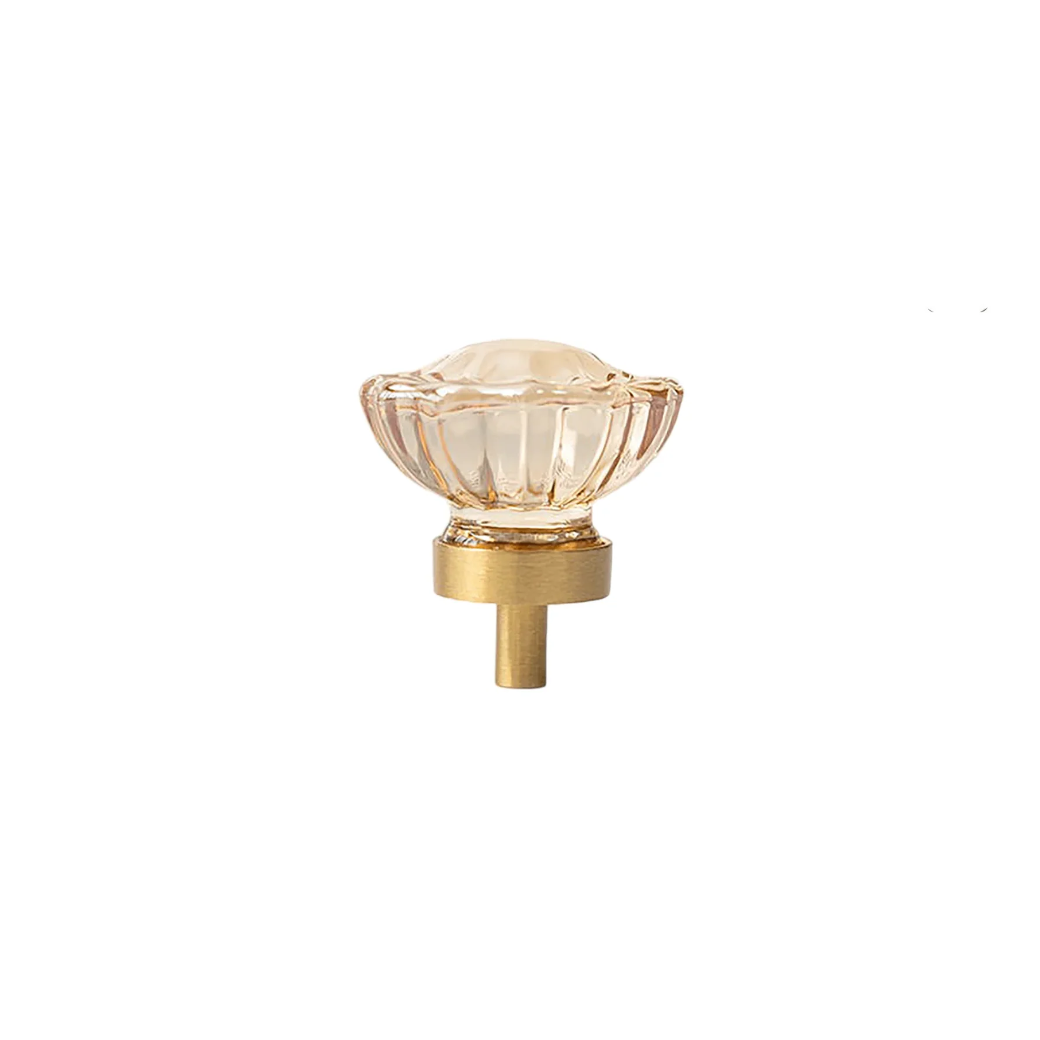 Faceted crystal and brass cabinet knob by Brass Essence, showcasing a elegant, shiny crystal with brass accents on a modern cabinet door.