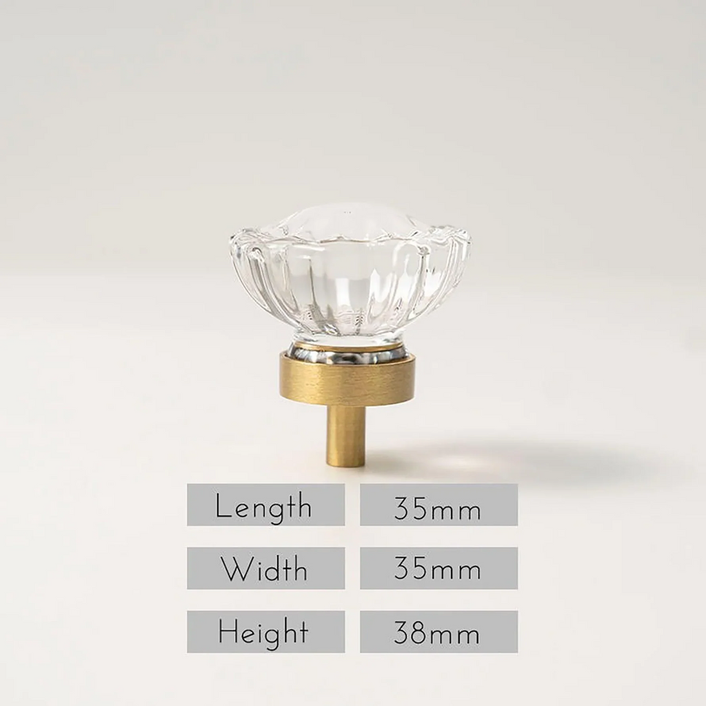 Faceted crystal and brass cabinet knob by Brass Essence, featuring a sparkling crystal design and polished brass finish.