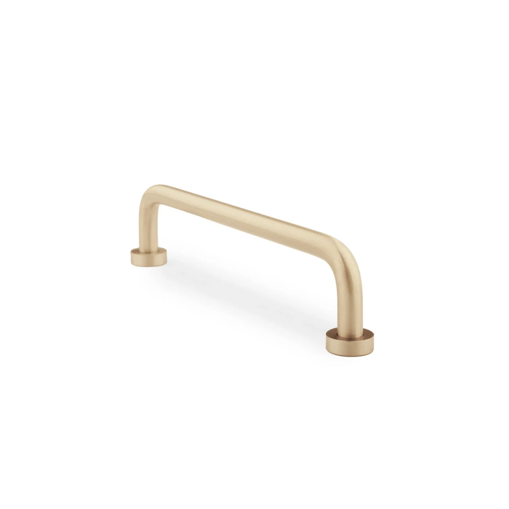 Brass Essence minimalist solid brass curved handle, sleek and modern door or drawer hardware with a smooth polished finish.