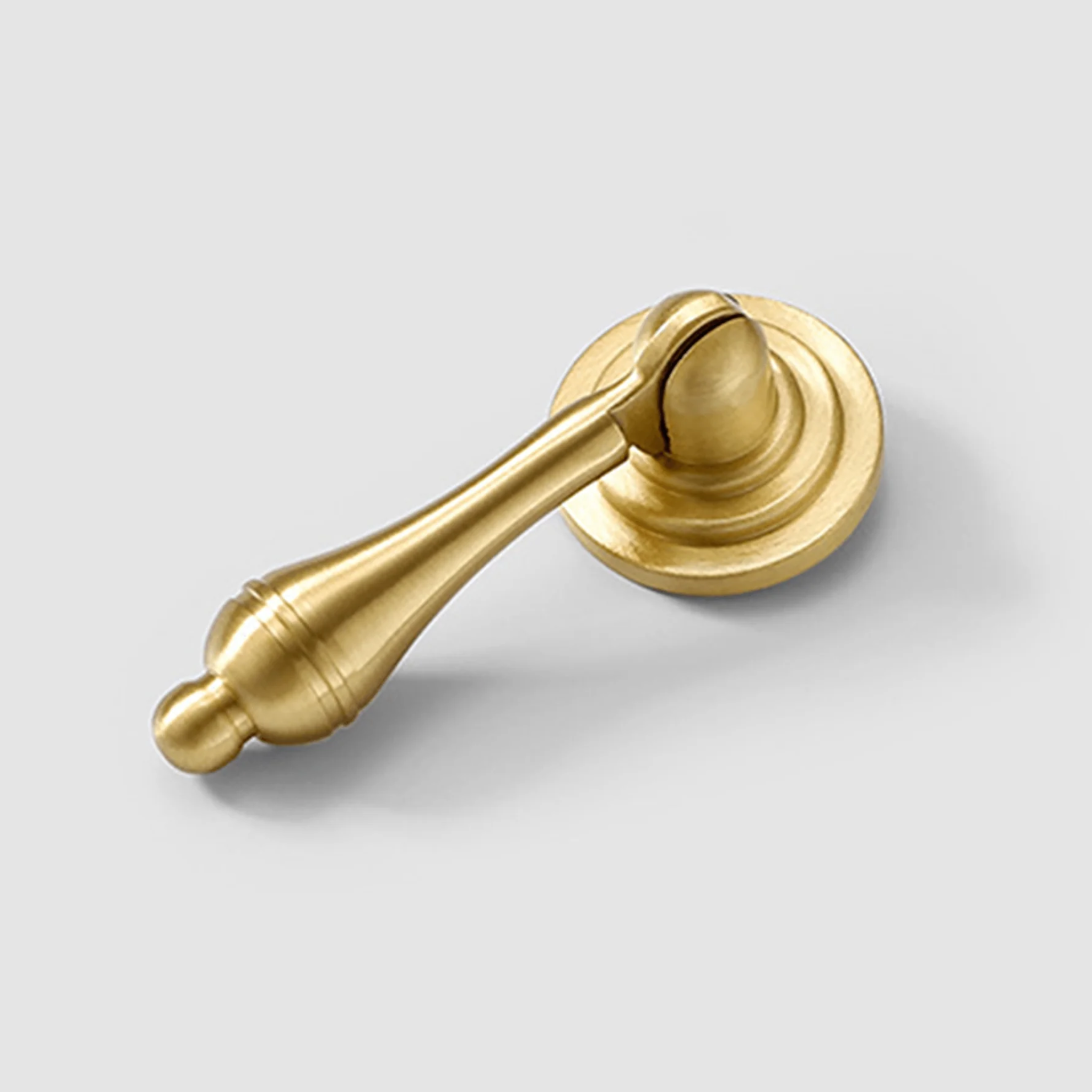 Brass Essence Legacy brushed brass cabinet lever handle with sleek, modern design and sturdy metal construction.