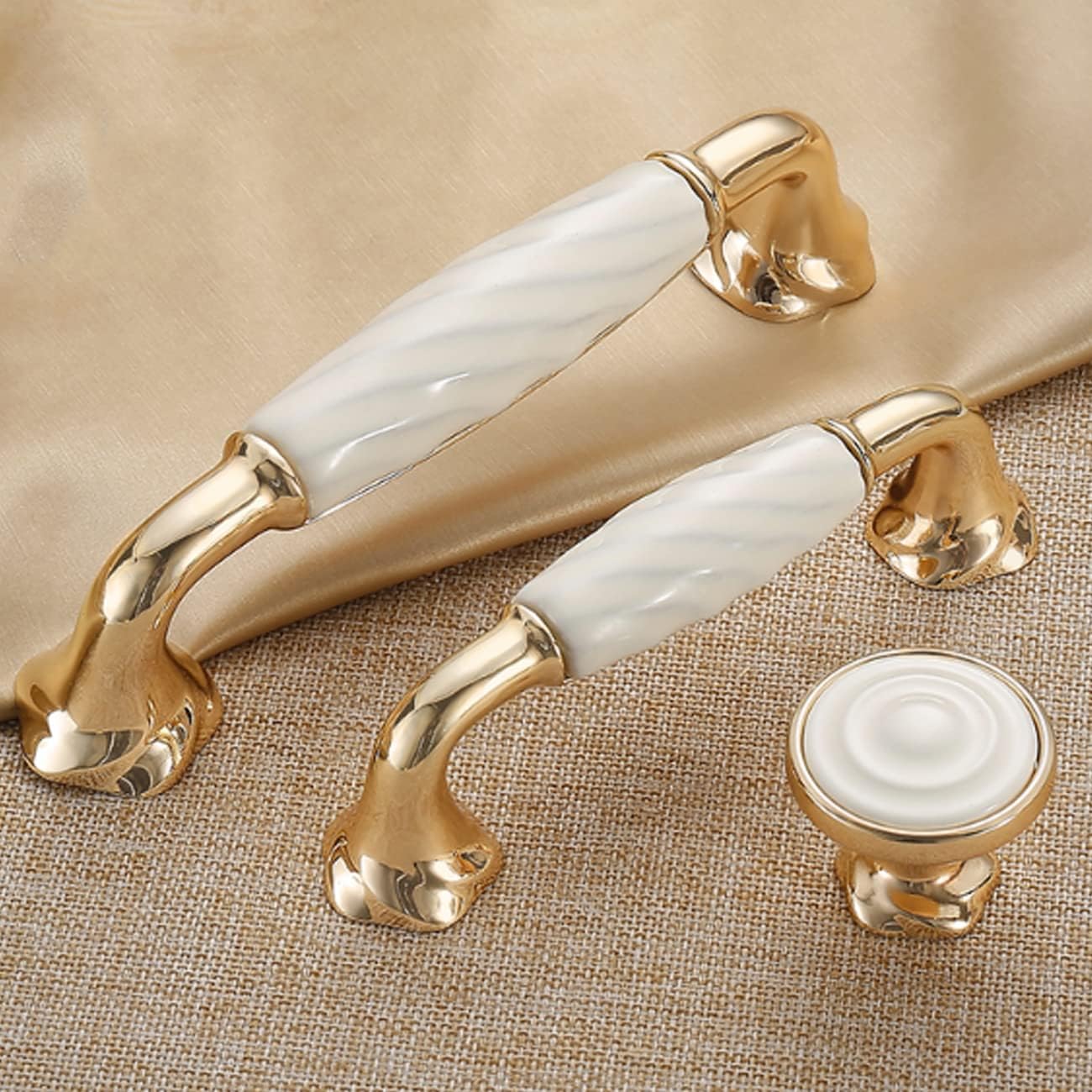 Brass Essence ridged ceramic and zinc cabinet pull with sleek design and textured surface for modern kitchen or furniture handles