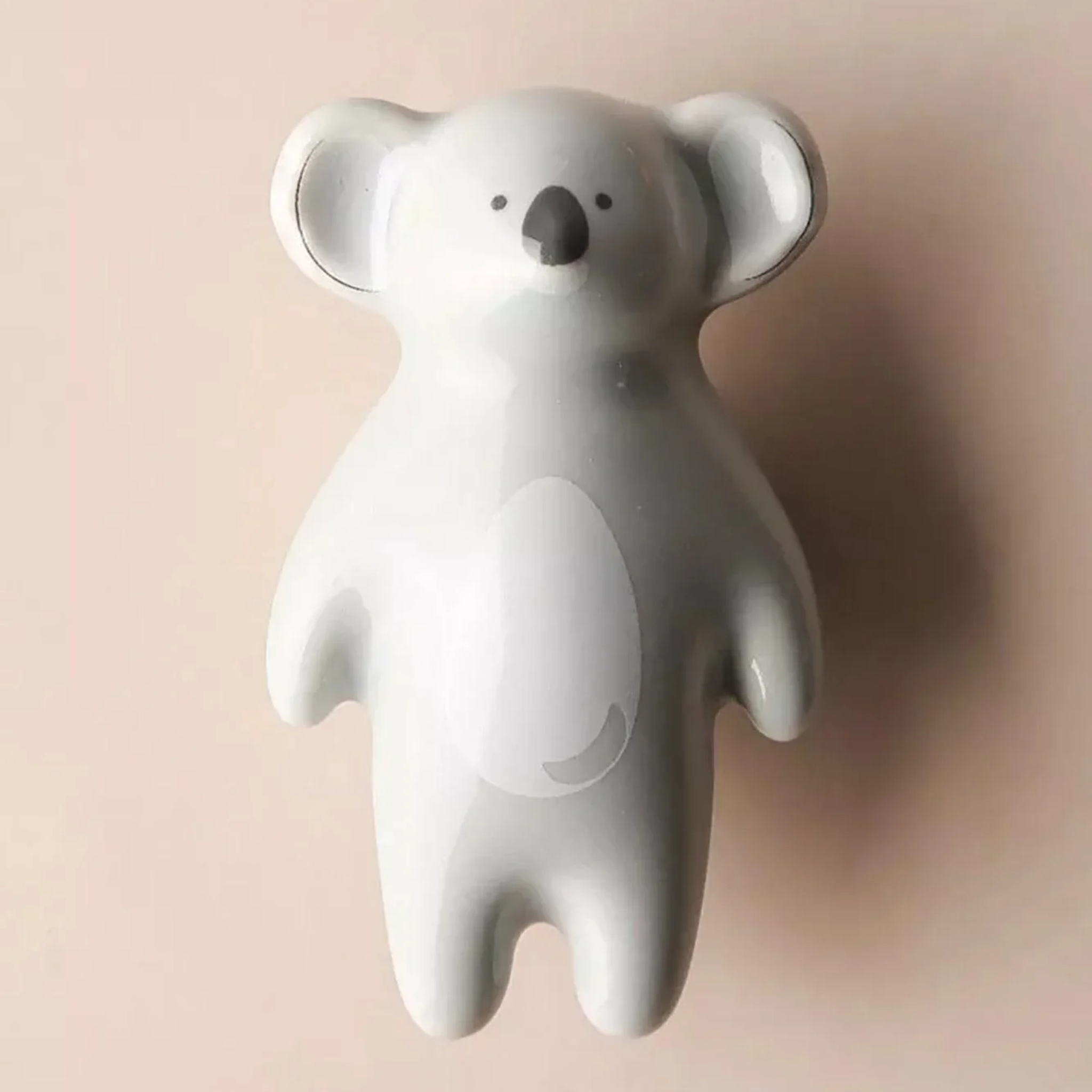 Ceramic animal cabinet pull from Brass Essence's collection, featuring a detailed animal design on a smooth ceramic surface.