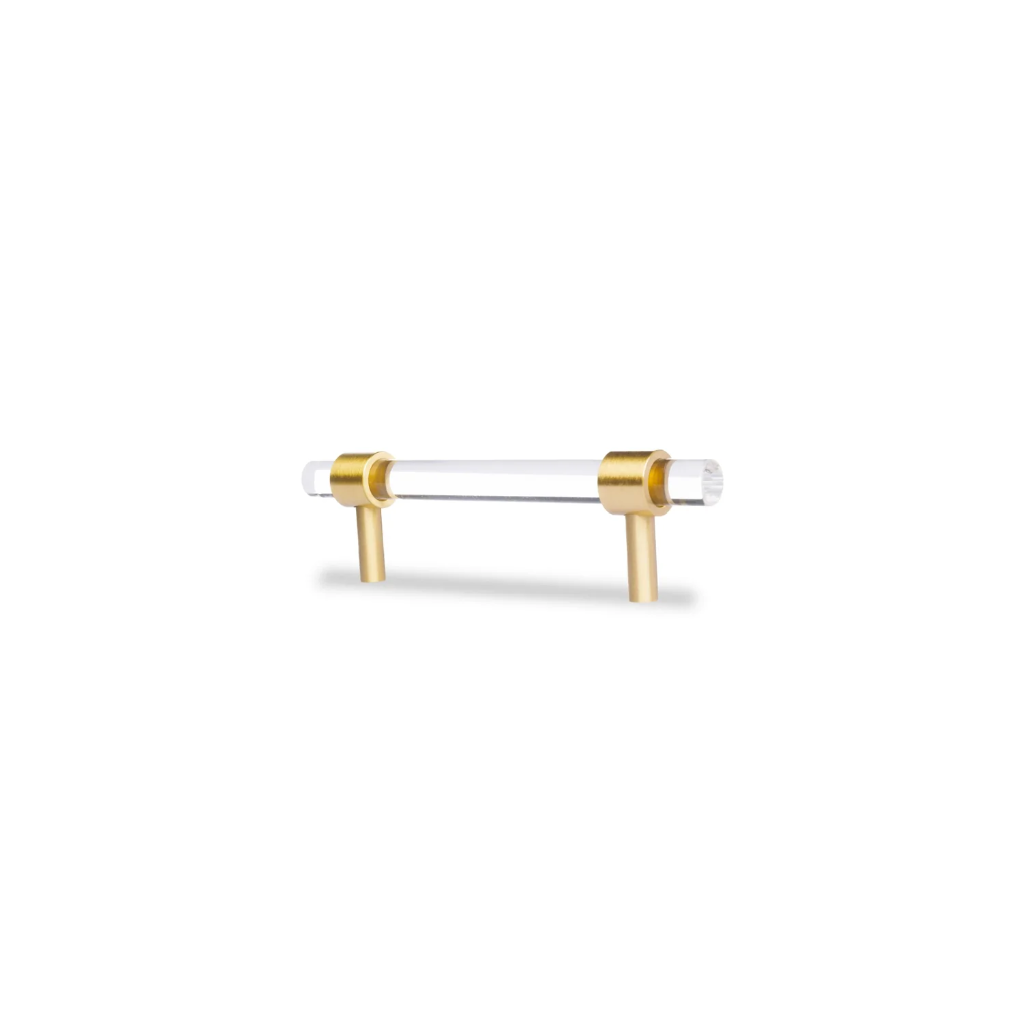 Clear acrylic and brass T-bar handle from Brass Essence collection, showing sleek modern design on a white background.