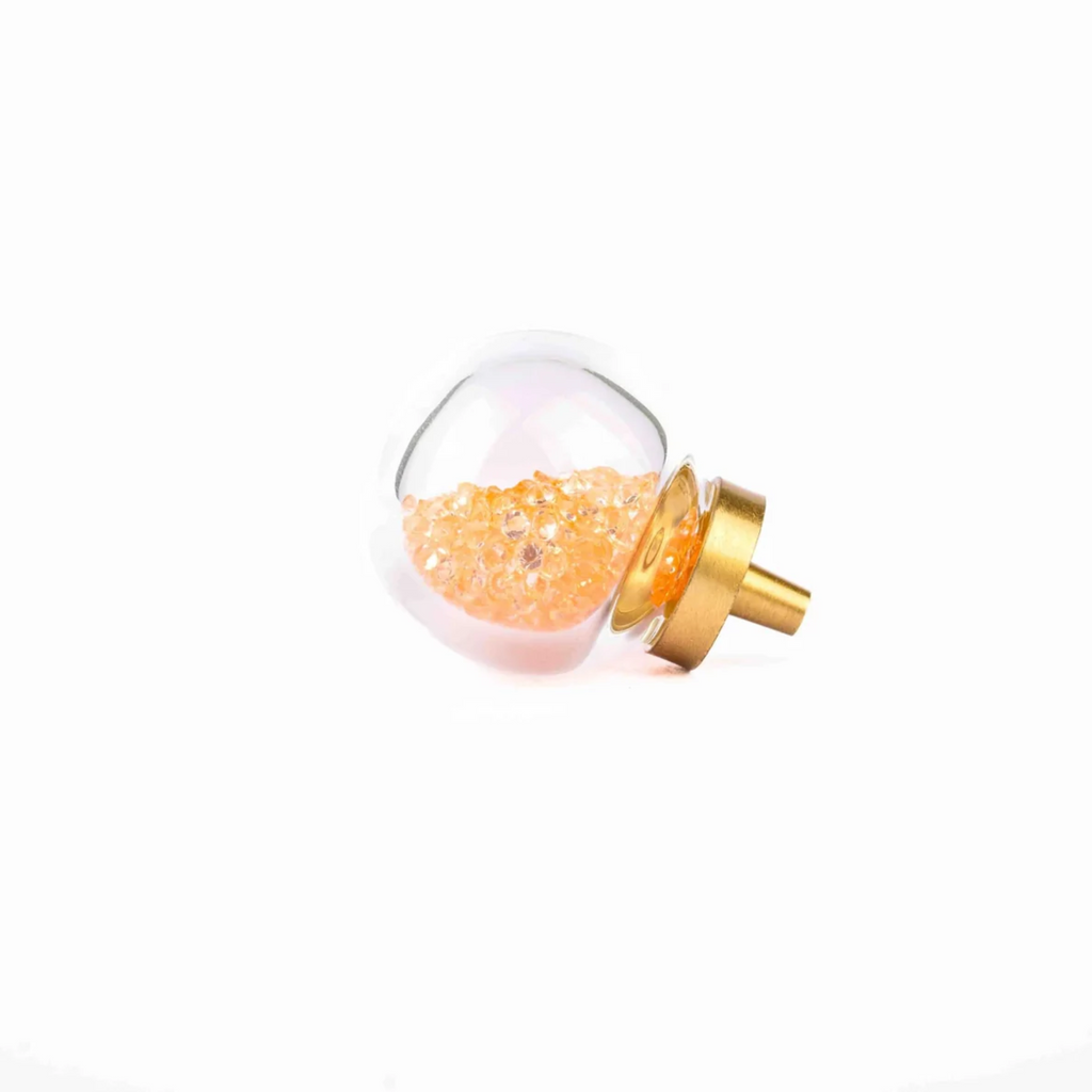 Brass Essence Moon Orb Glitter Glass and Brass Knob with a shiny, spherical design and intricate details for decorative furniture use