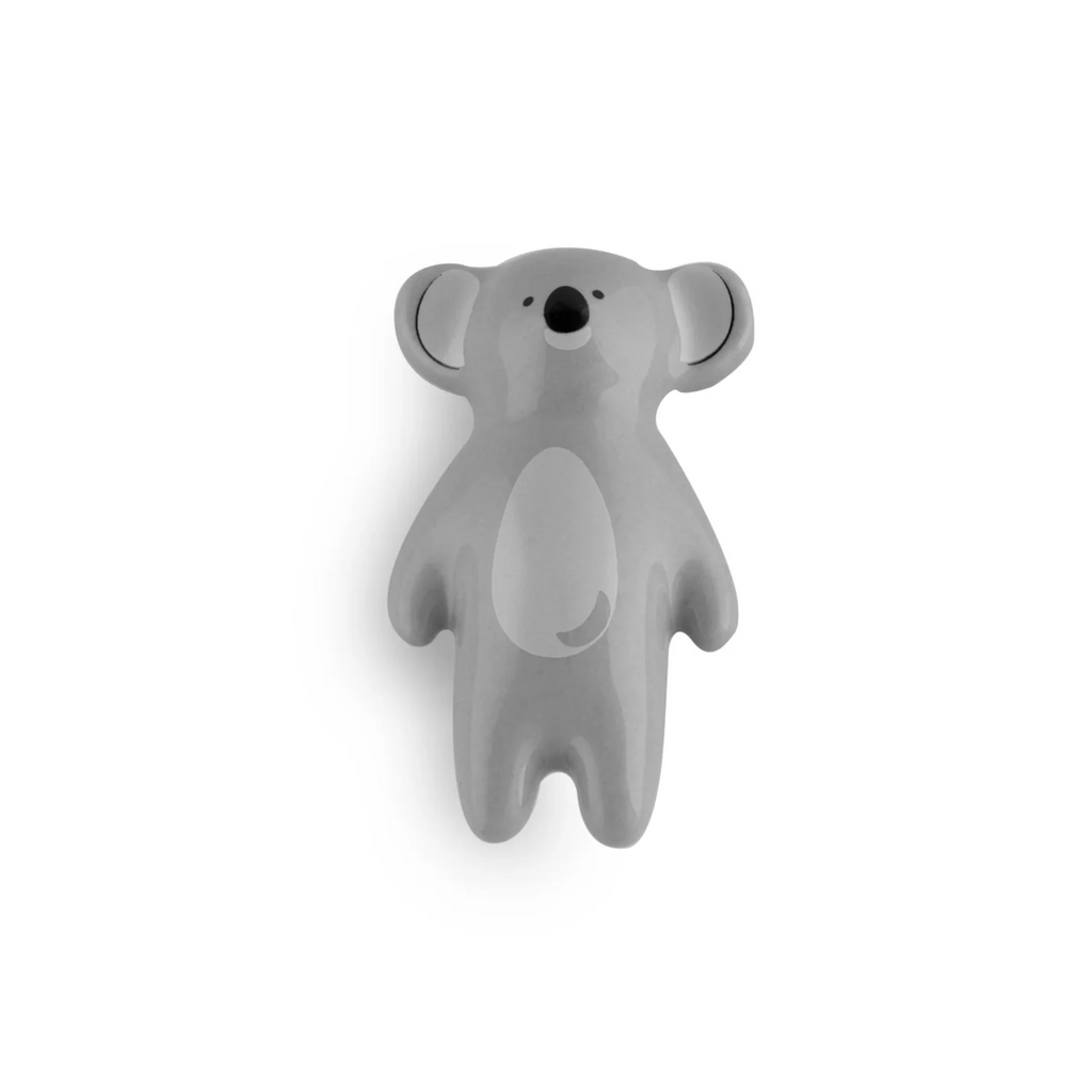 Ceramic animal cabinet pull from Brass Essence's collection, featuring a detailed animal design for furniture decor.