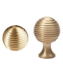 Brass essence Alexander & Wicks brass knob with luxury brushed finish, showcasing a sleek, rounded design for cabinet or drawer use.